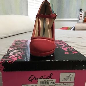 Red high heel shoes